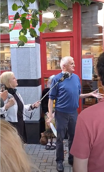 Pat McMahon, former Galway City and County Librarian, speaking at the Galway City Museum's 2024 Culture Night Walking Tour of Galway City